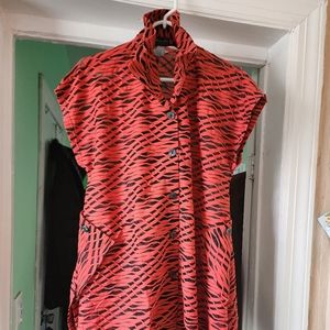 Damee Inc. Dark orange and black pattern; see-thew stretchy material.